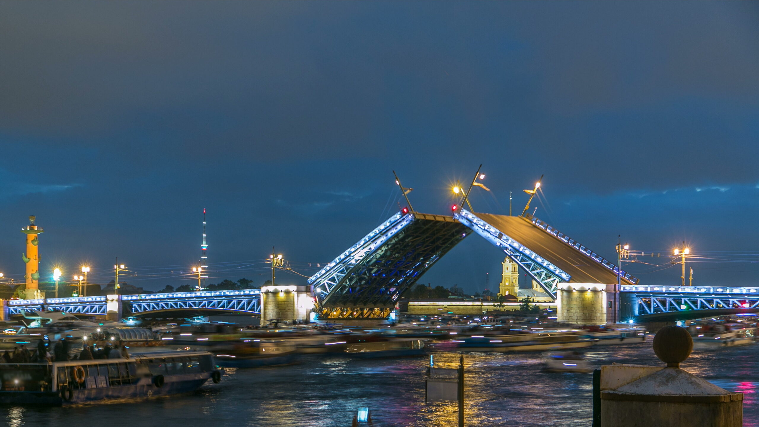 View of the opening Palace Bridge timelapse which spans between - the spire of Peter and Paul Fortress