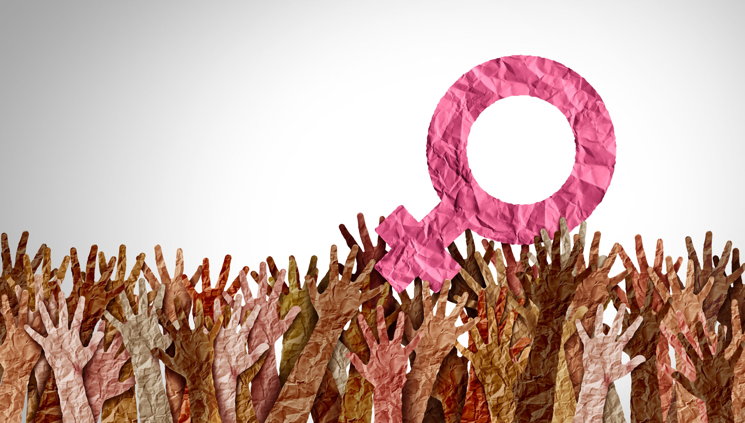 Crowd of raised hands in earth tones with a large pink crumpled-paper female symbol overhead, signaling women's rights.