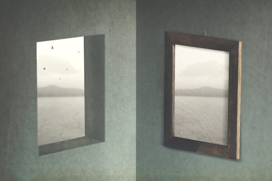 Gallery wall with two hanging frames: left shows a pale landscape photo, right is an empty canvas in a dark wooden frame.