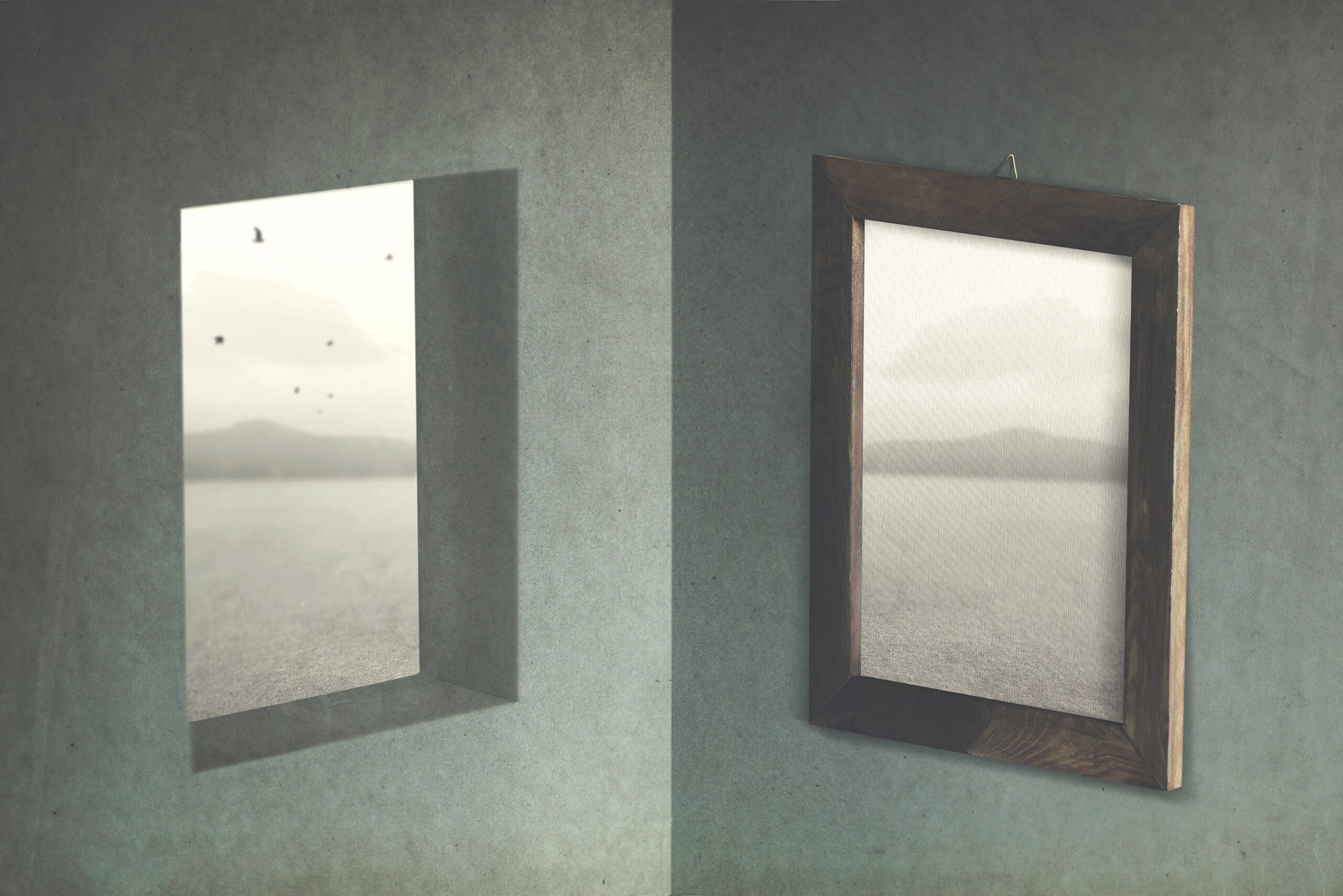 Gallery wall with two hanging frames: left shows a pale landscape photo, right is an empty canvas in a dark wooden frame.