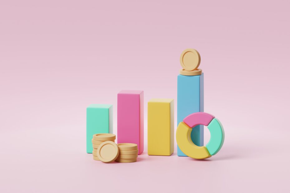 Colorful stacked blocks with coin piles and rings on a pink background, suggesting growth or wealth building.