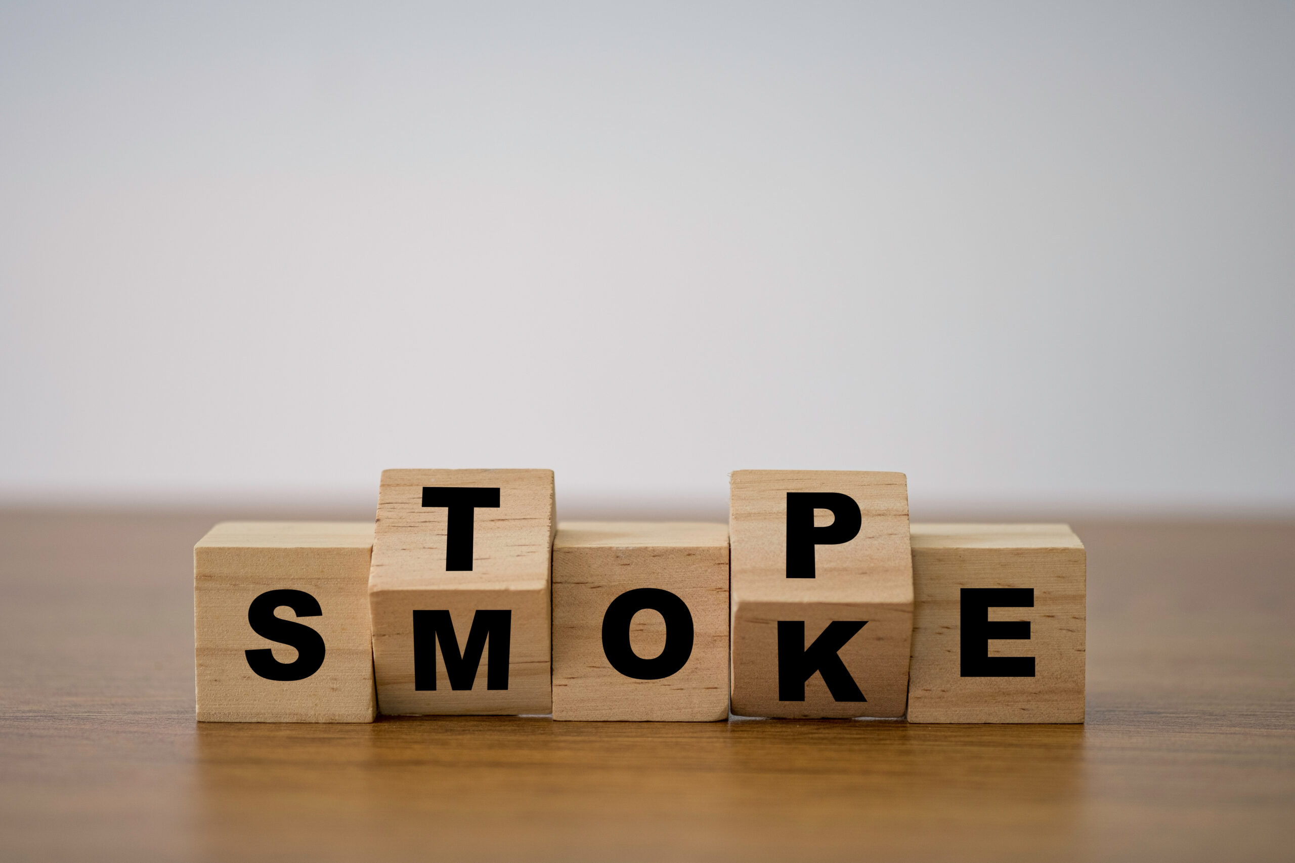 Flipping wooden cubes block which print screen stop smoking to good health condition