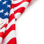 White prescription pills on United States flag