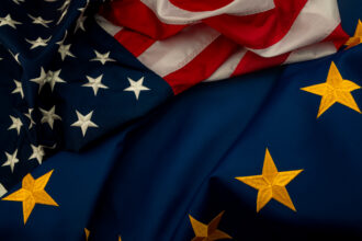 TTIP USA and EU cooperation and Transatlantic Trade and Investment Partnership concept theme with the flags of the United states of America and the European Union