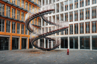 Umschreibung sculpture also called the endless staircase - Work by Olafur Eliasson 2004 - permanent installation in front of KPMG offices - Munich Bavaria Germany - OHE